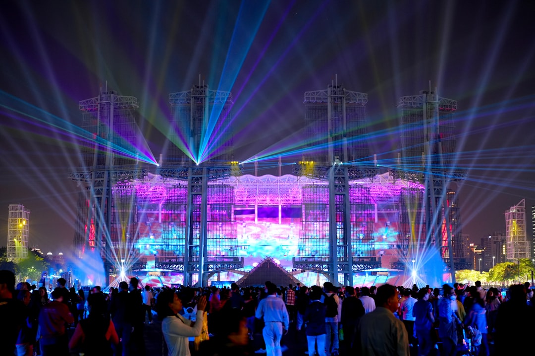 A crowd of people standing around a stage