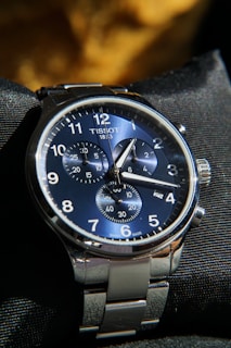 A close up of a watch on a person's wrist