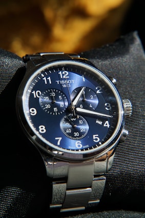 A close up of a watch on a person's wrist