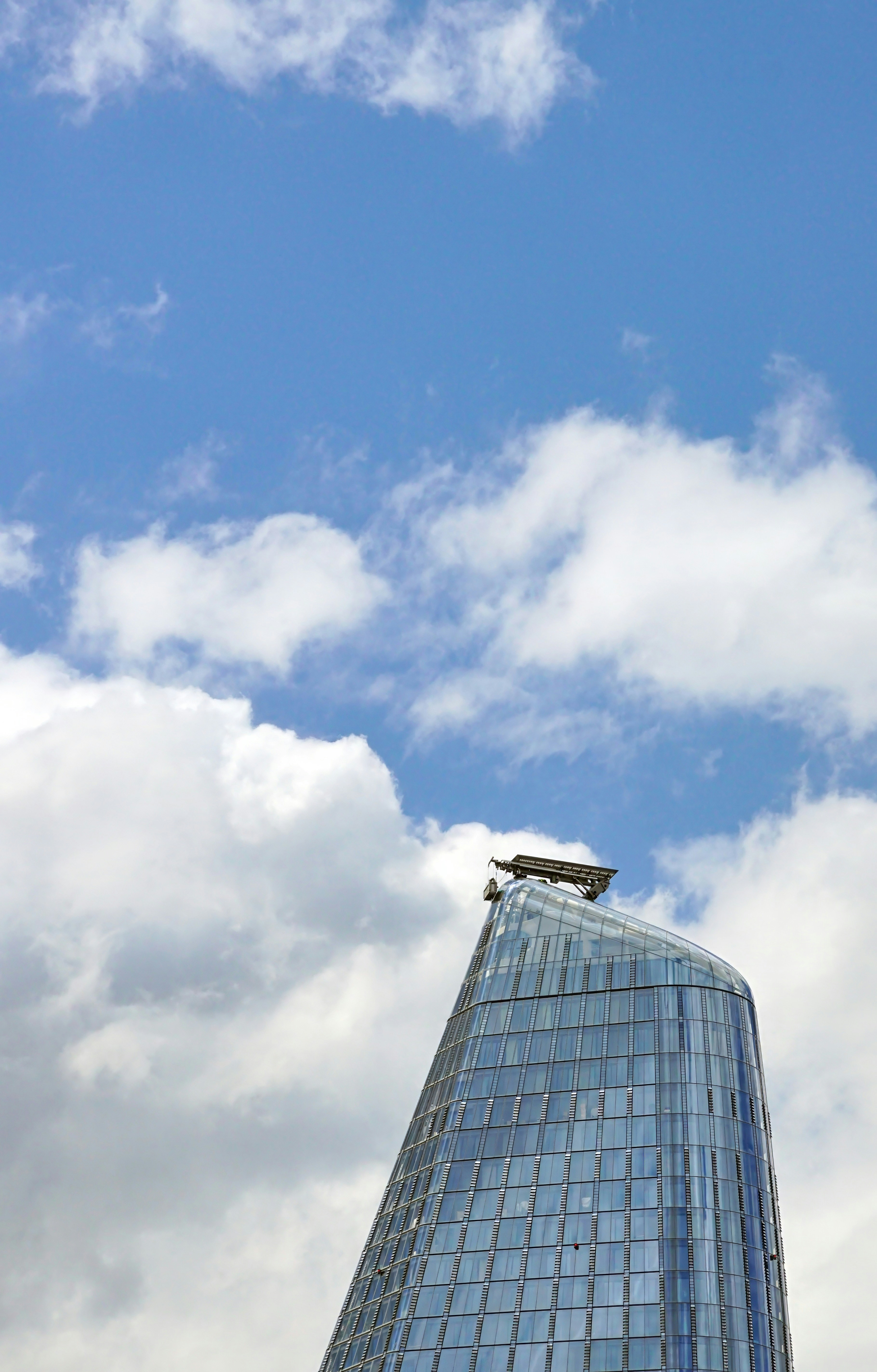 A very tall building with a sky background