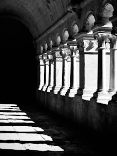 A black and white photo of a tunnel