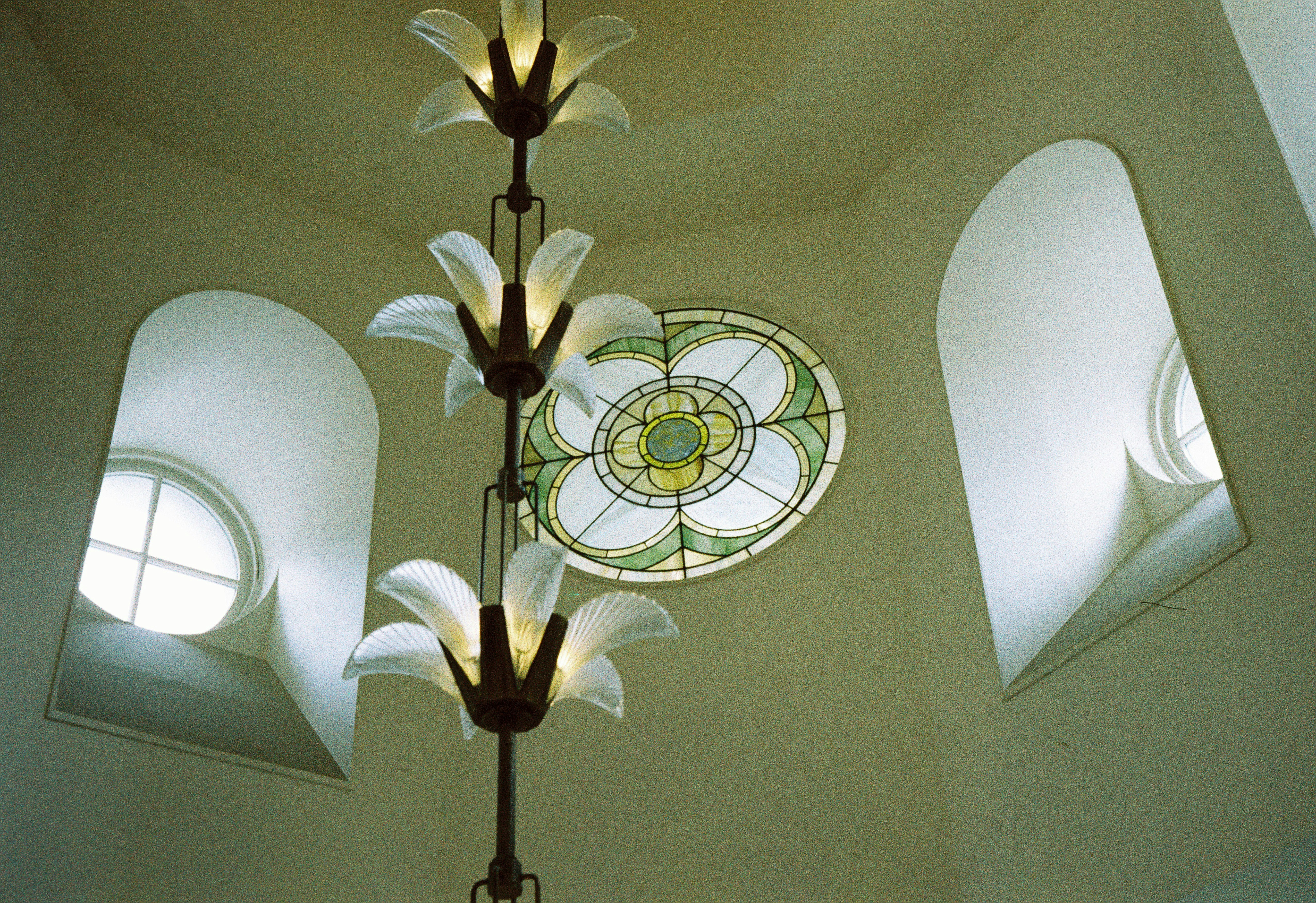 A large clock mounted to the side of a wall
