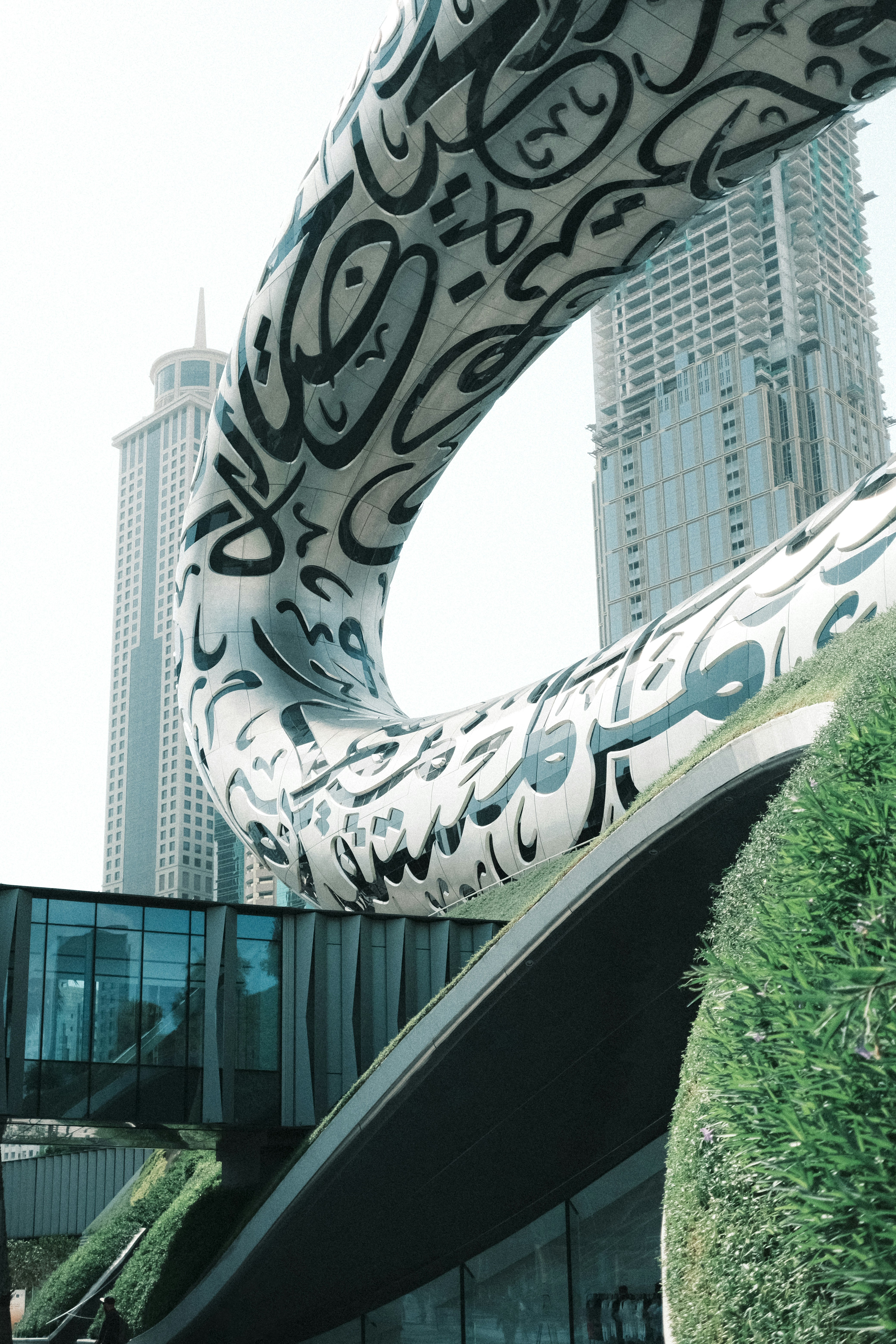 A woman standing in front of a building