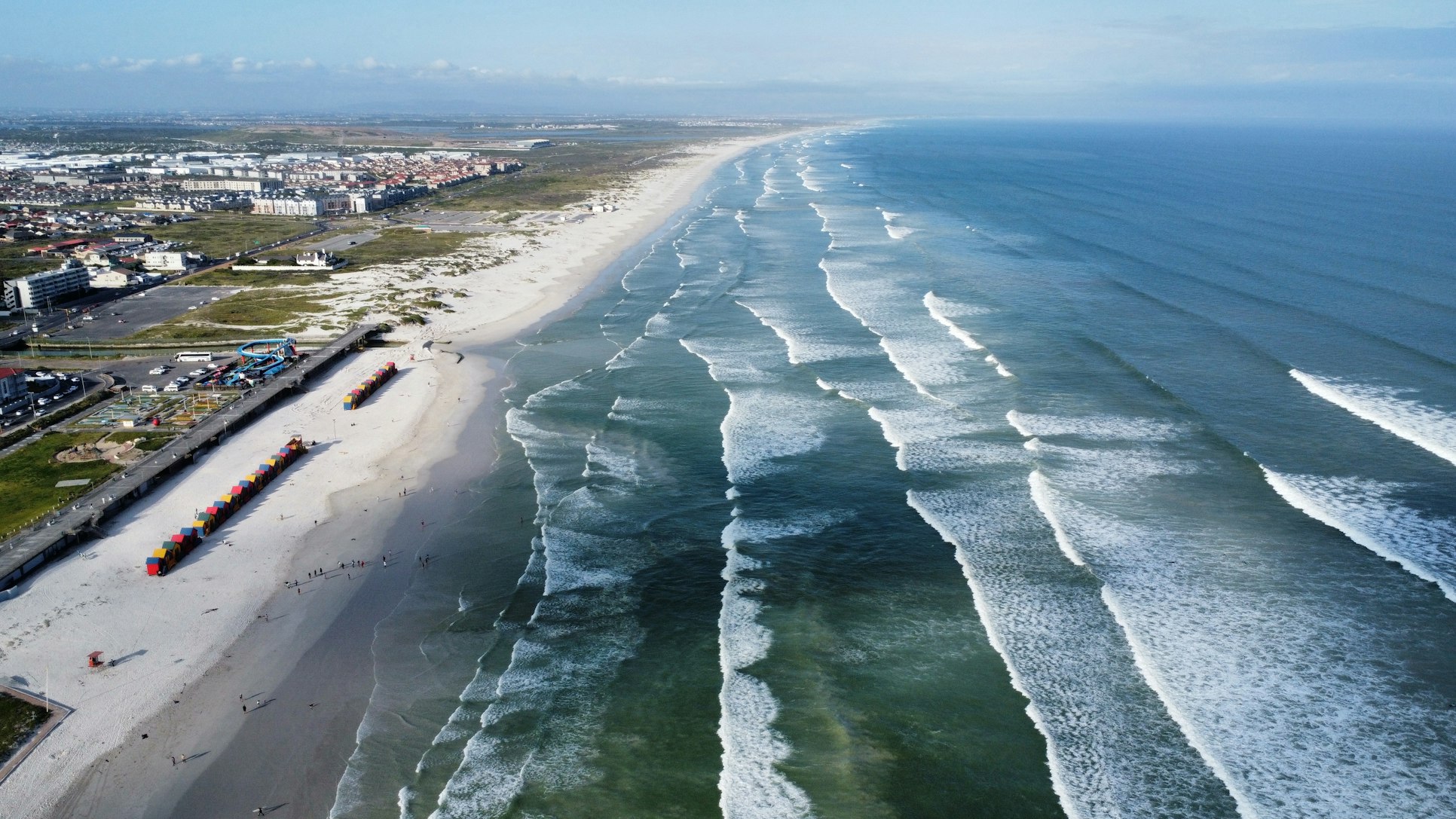 Muizenberg Beach colourful bathing boxes Cape Town