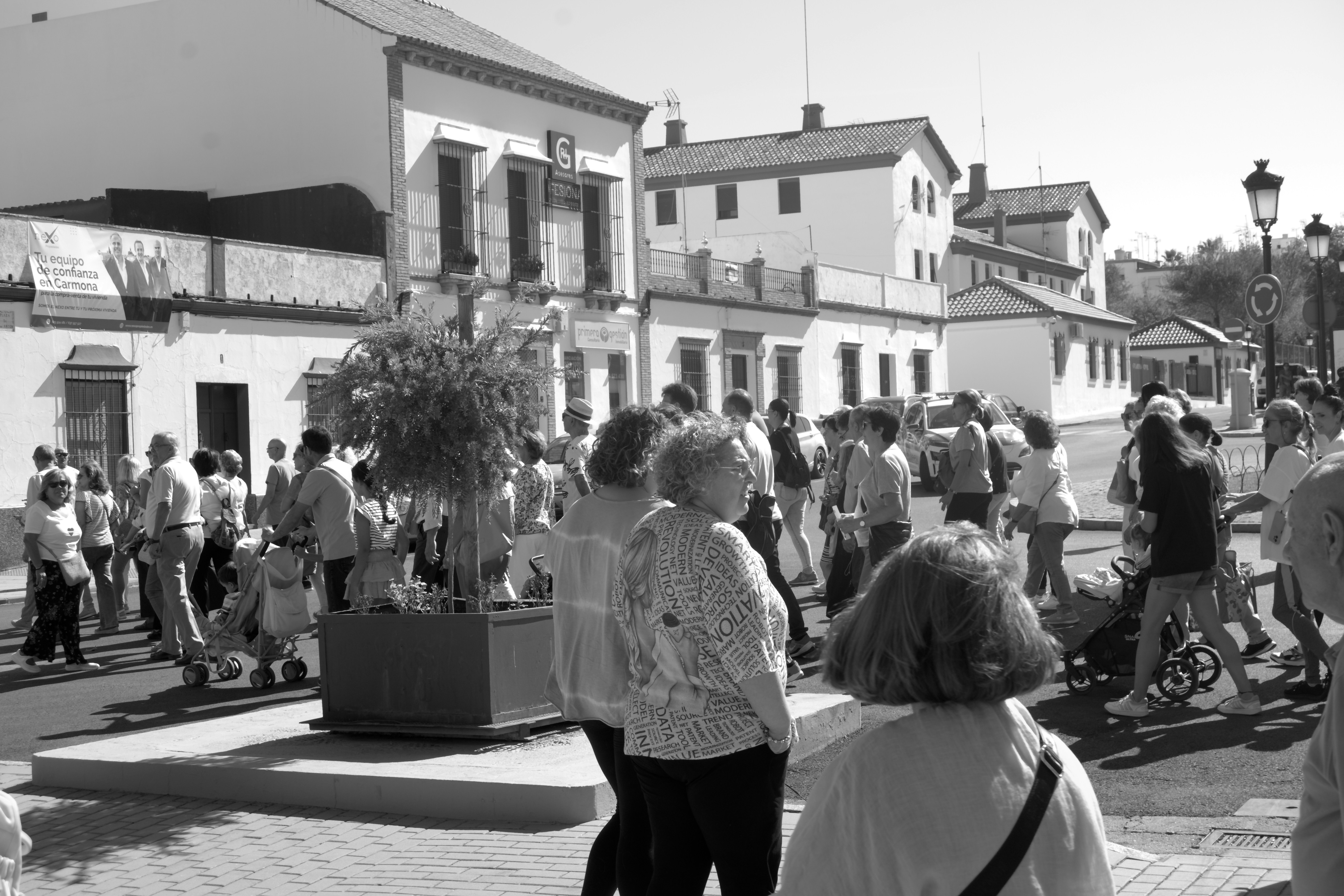 A black and white photo of a crowd of people