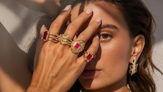 A woman holding her hands to her face