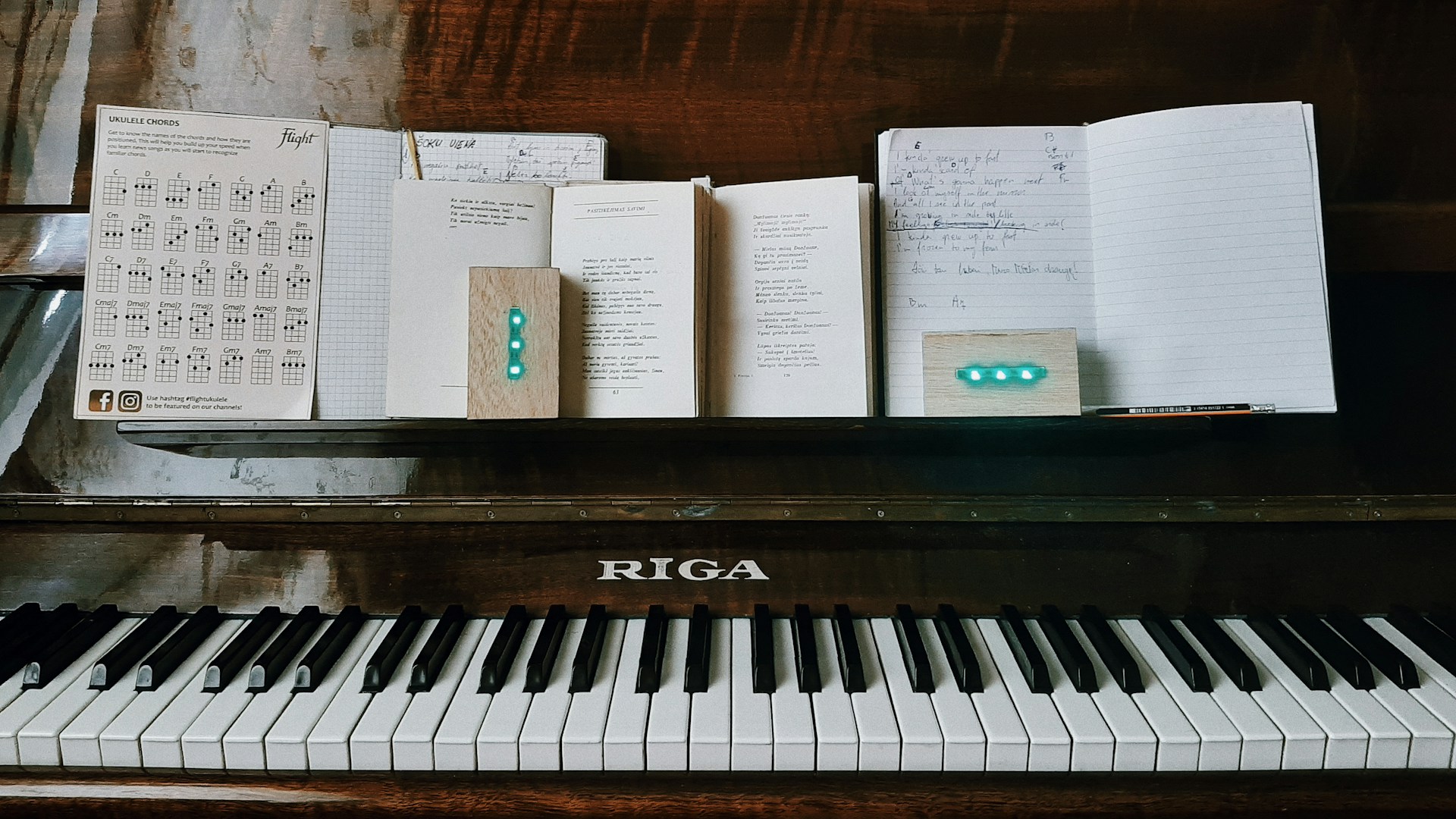 A close up of a piano with notes on it
