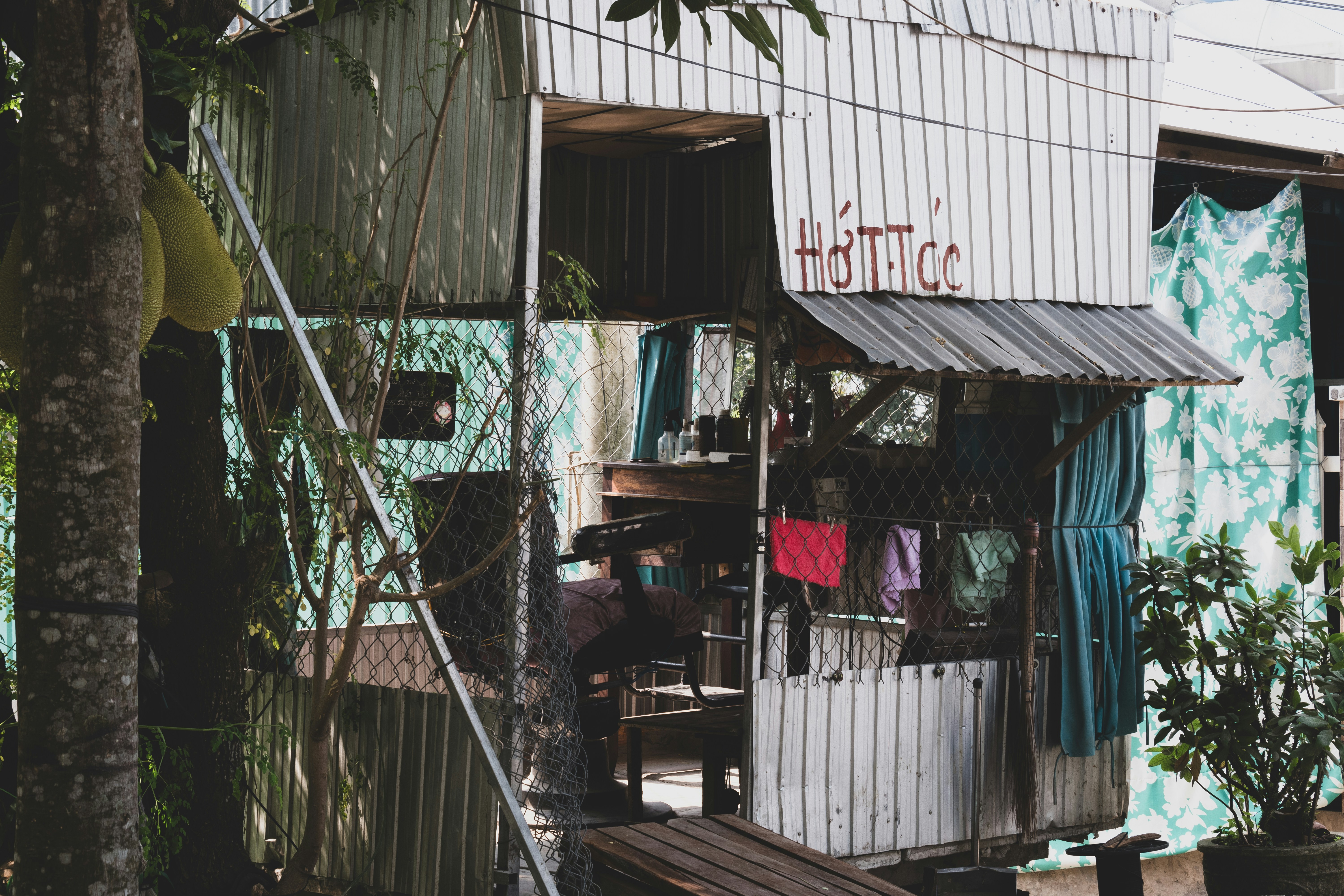 A man is standing outside of a building