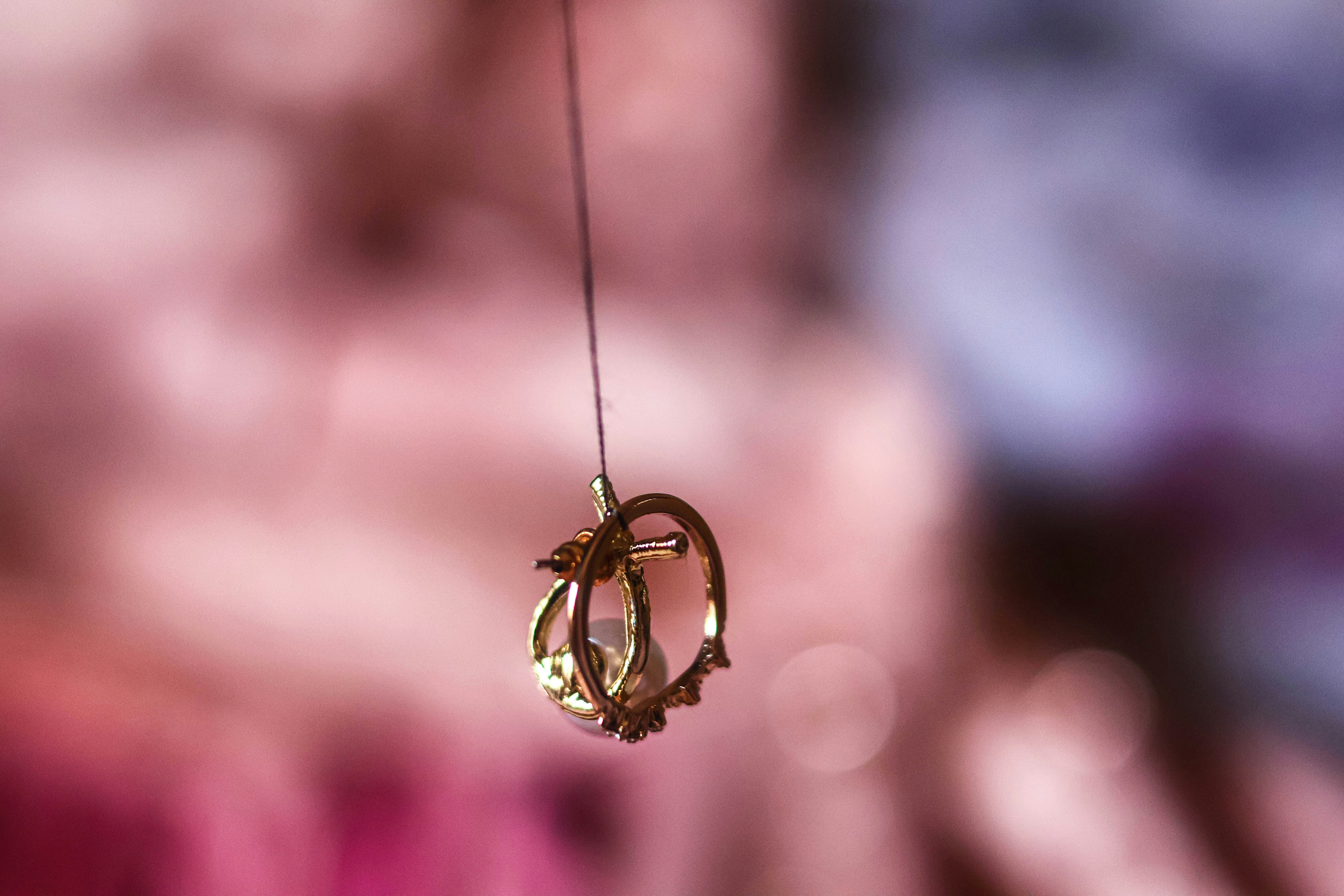 A close up of a wind chime with a blurry background