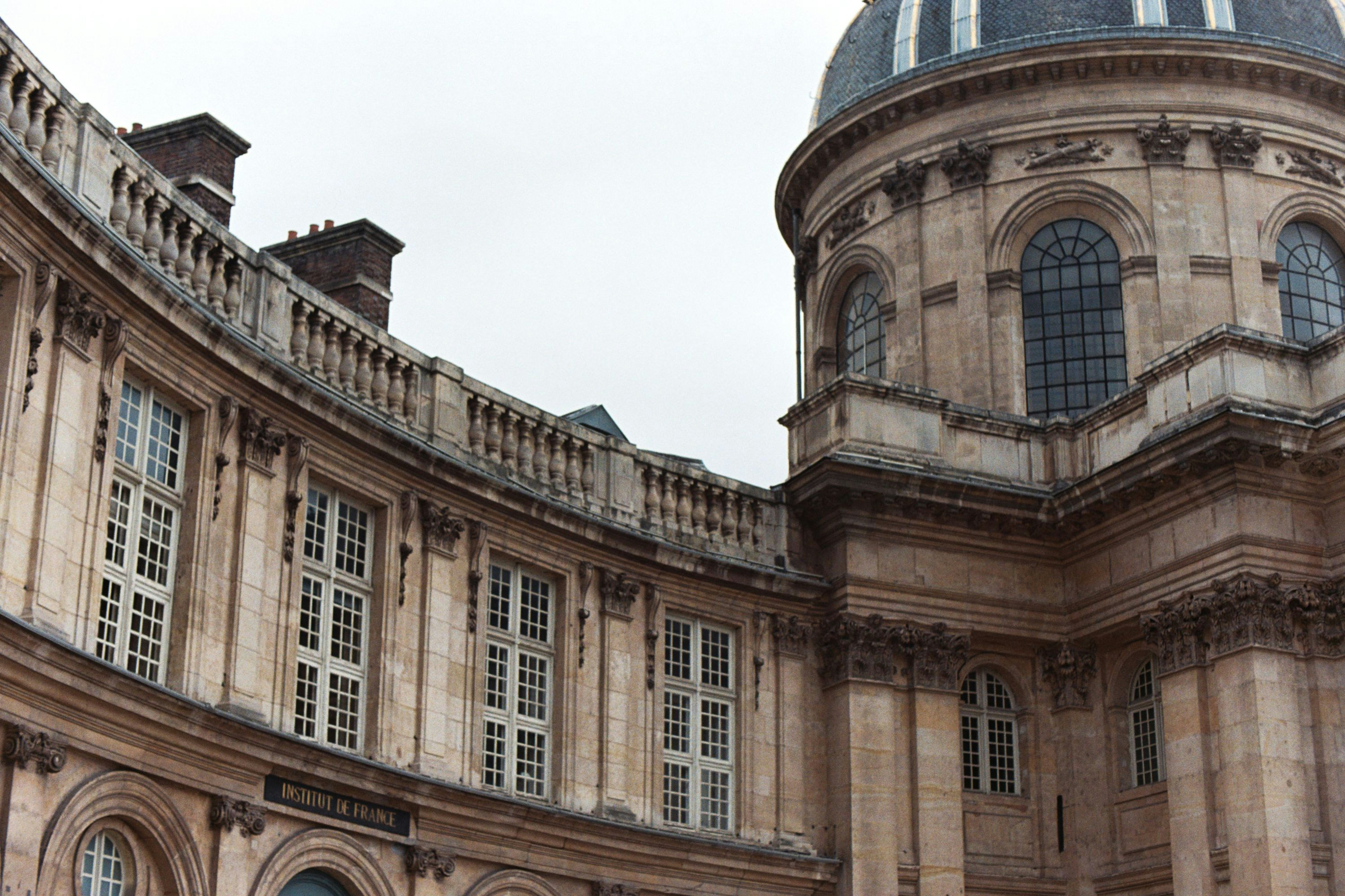 A large building with a clock on the front of it