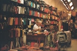 A man sitting at a table in a store