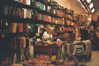 A man sitting at a table in a store