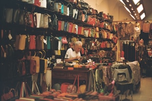 A man sitting at a table in a store