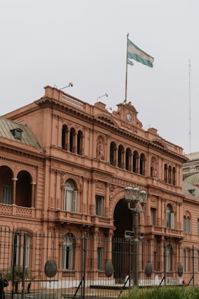 A large building with a flag on top of it