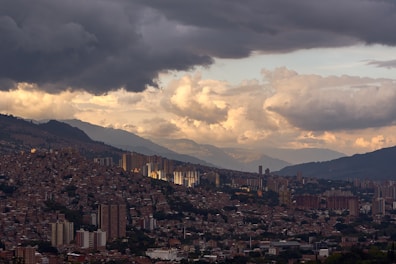 A view of a city with mountains in the background