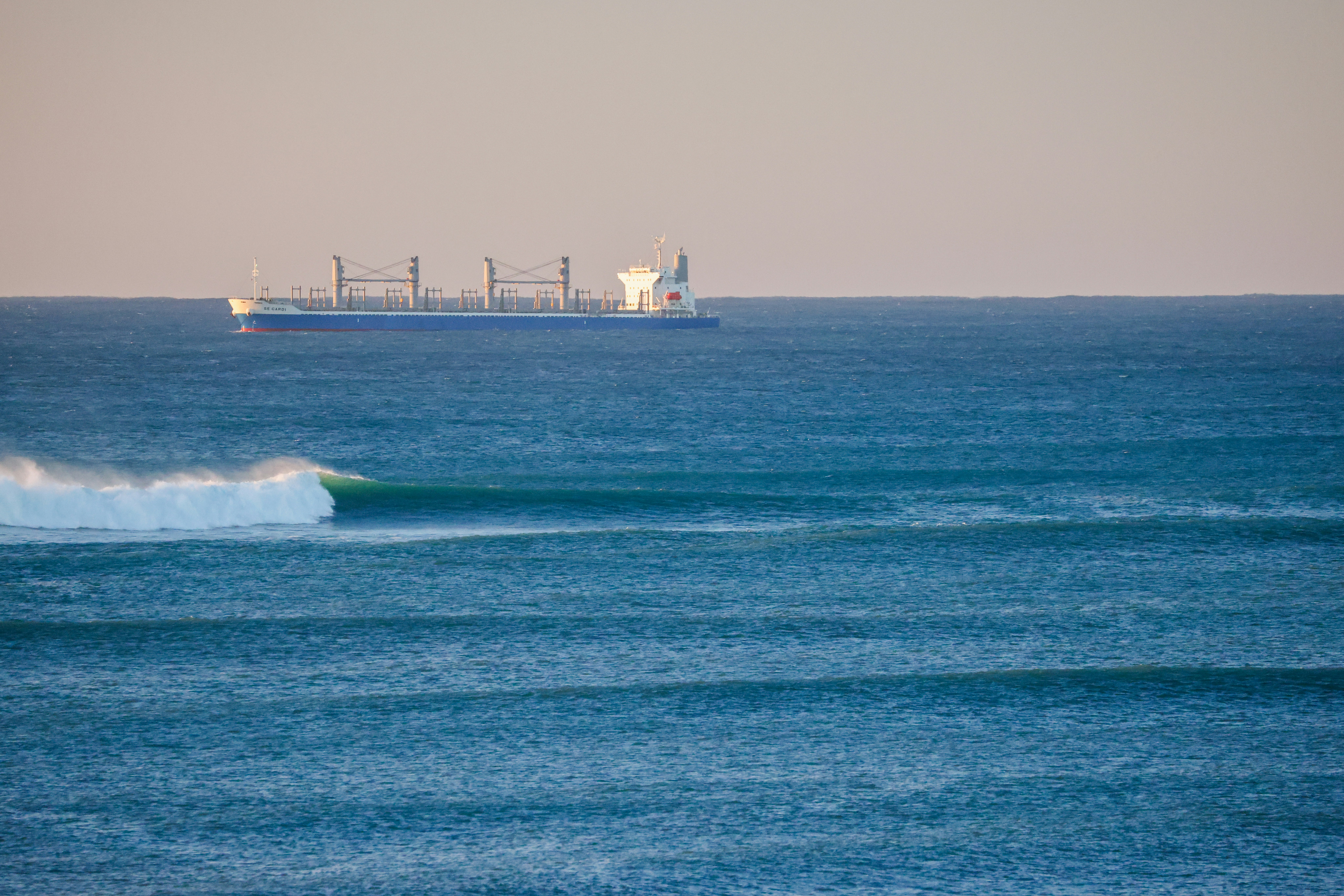 A boat is out in the open water