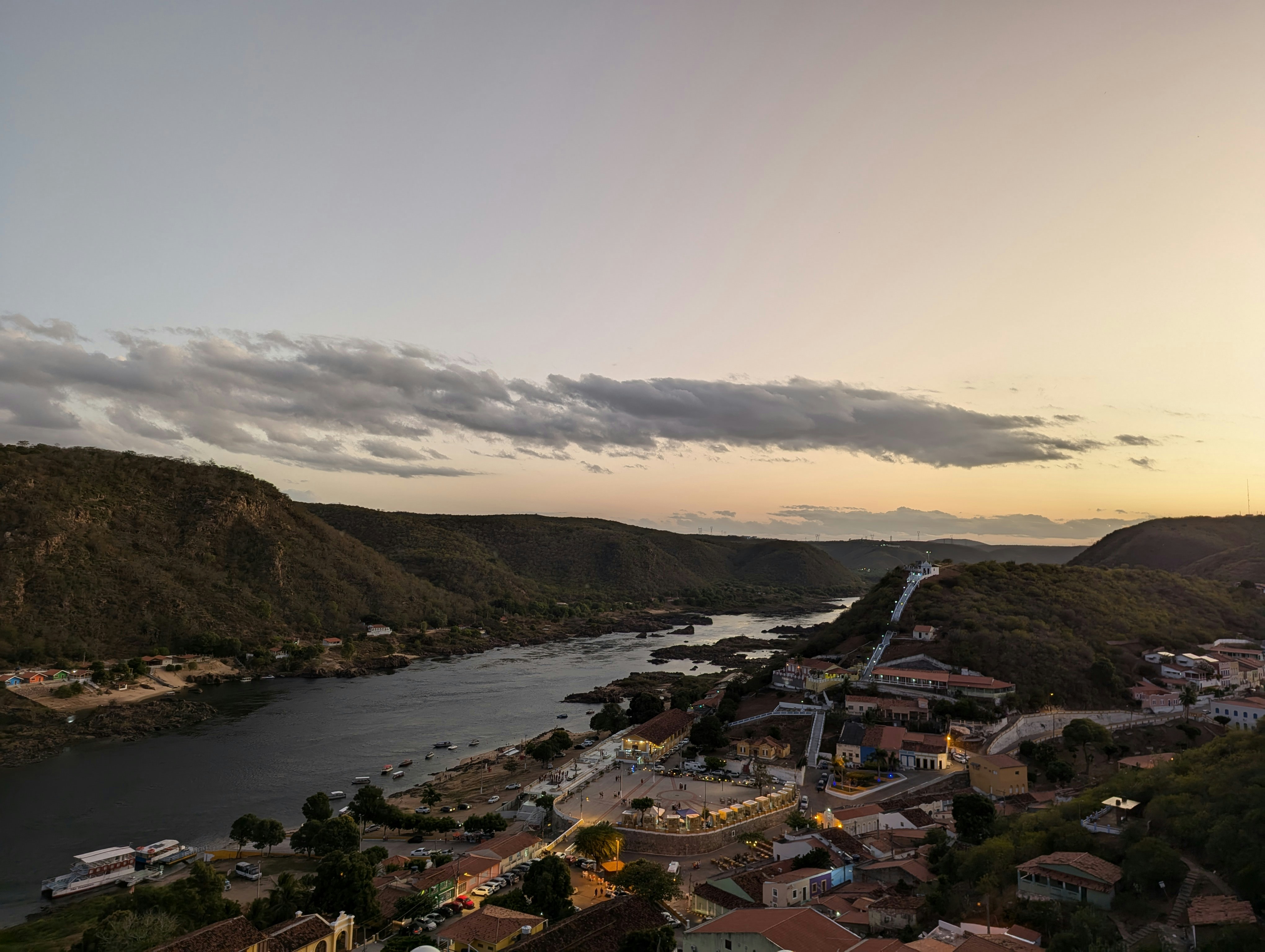 A bird's eye view of a town and a river