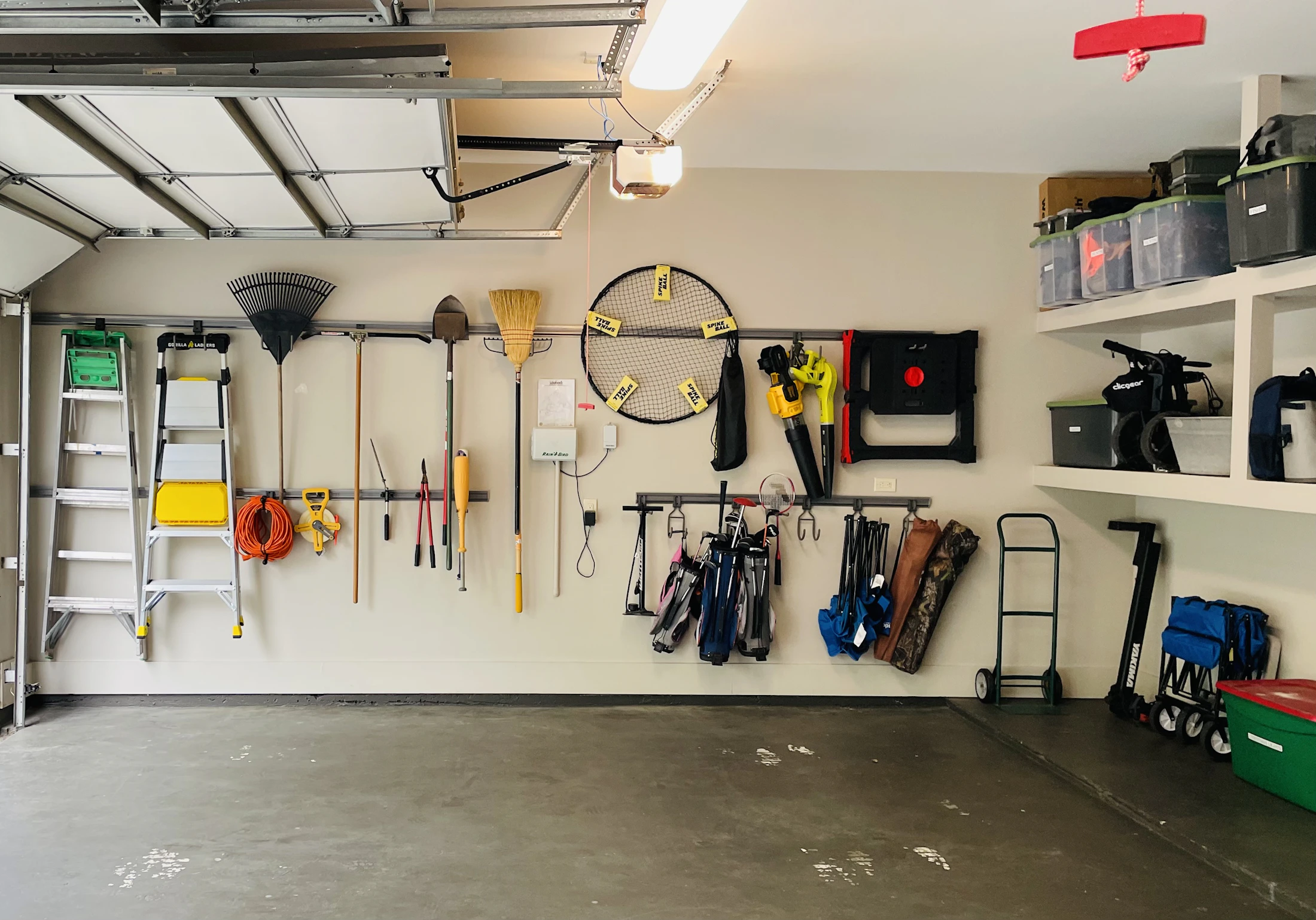 Organized garage wall with tools and practical equipment