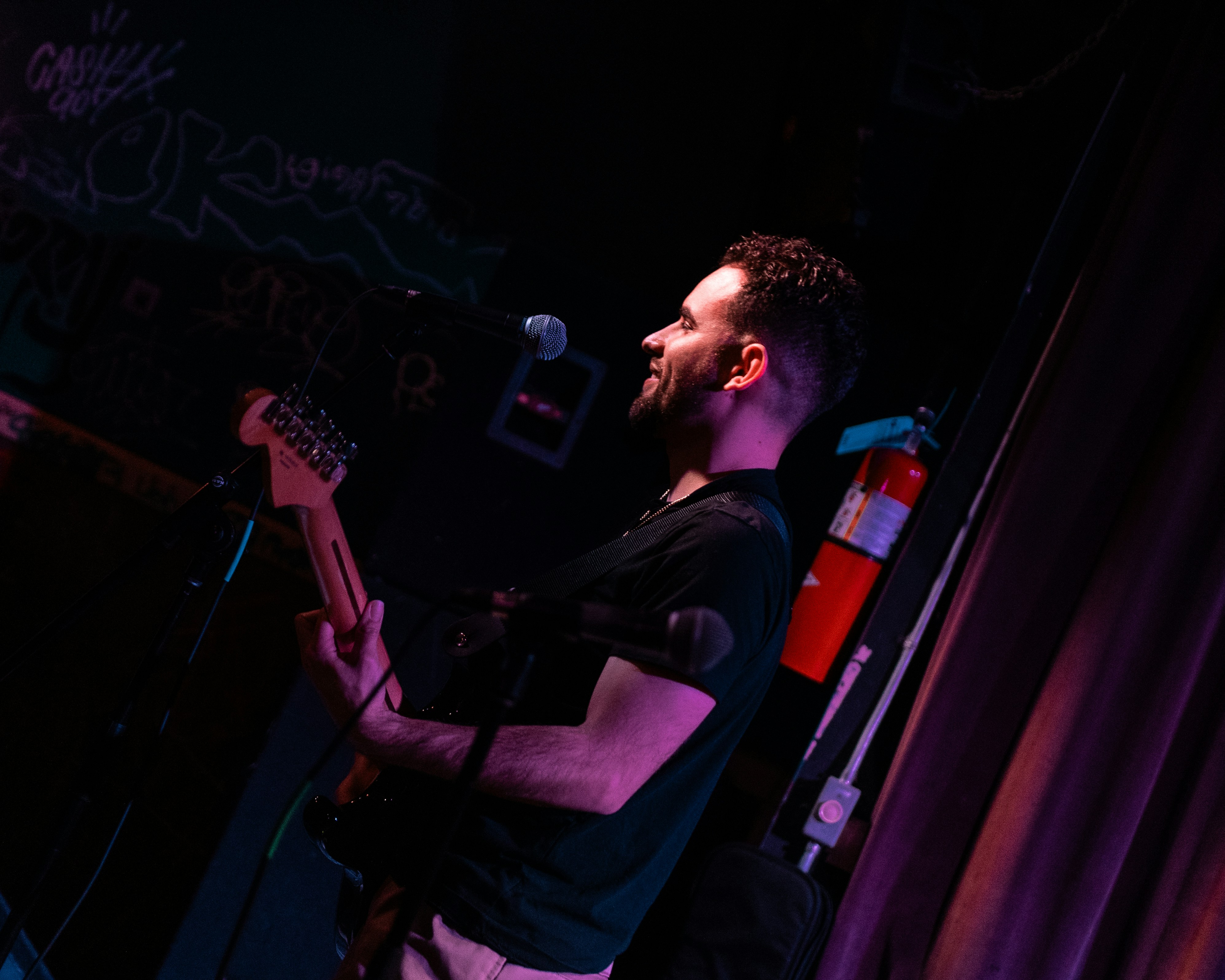 Musician performing with guitar