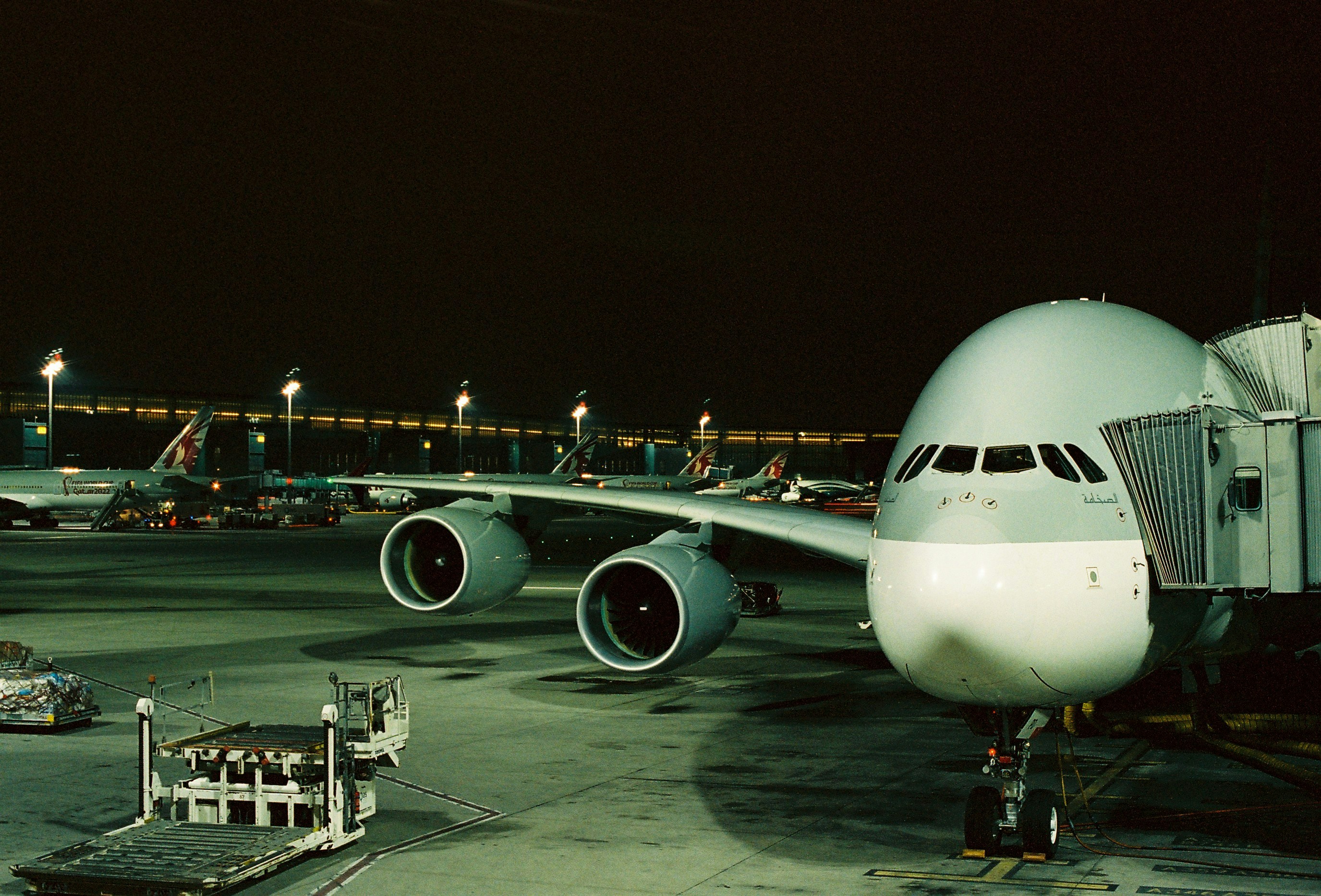 A large jetliner sitting on top of an airport tarmac