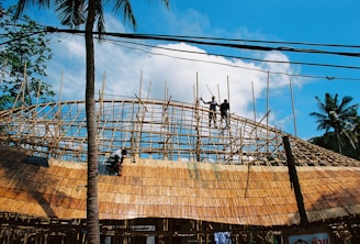 A group of people standing on top of a roof