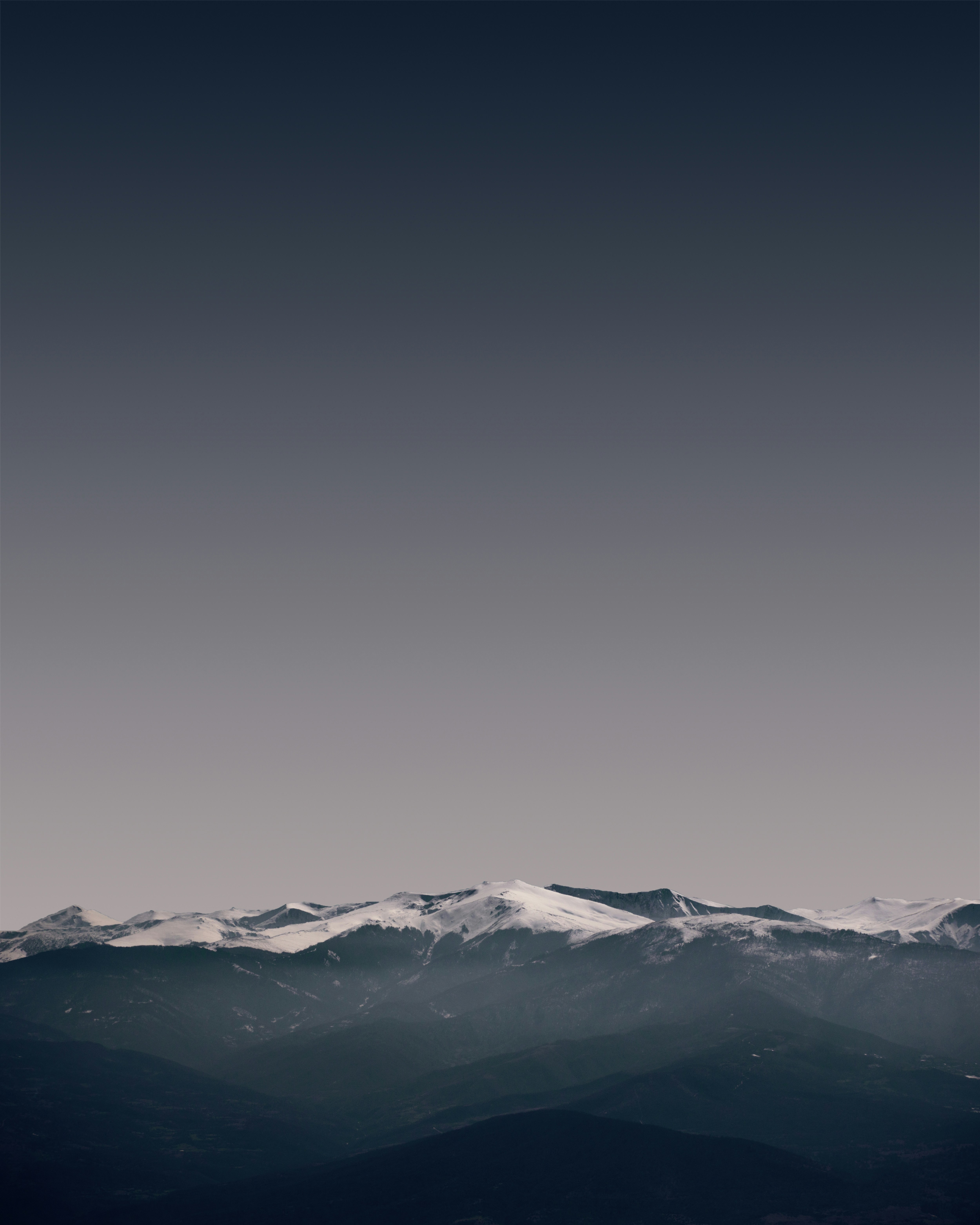 A black and white photo of a mountain range
