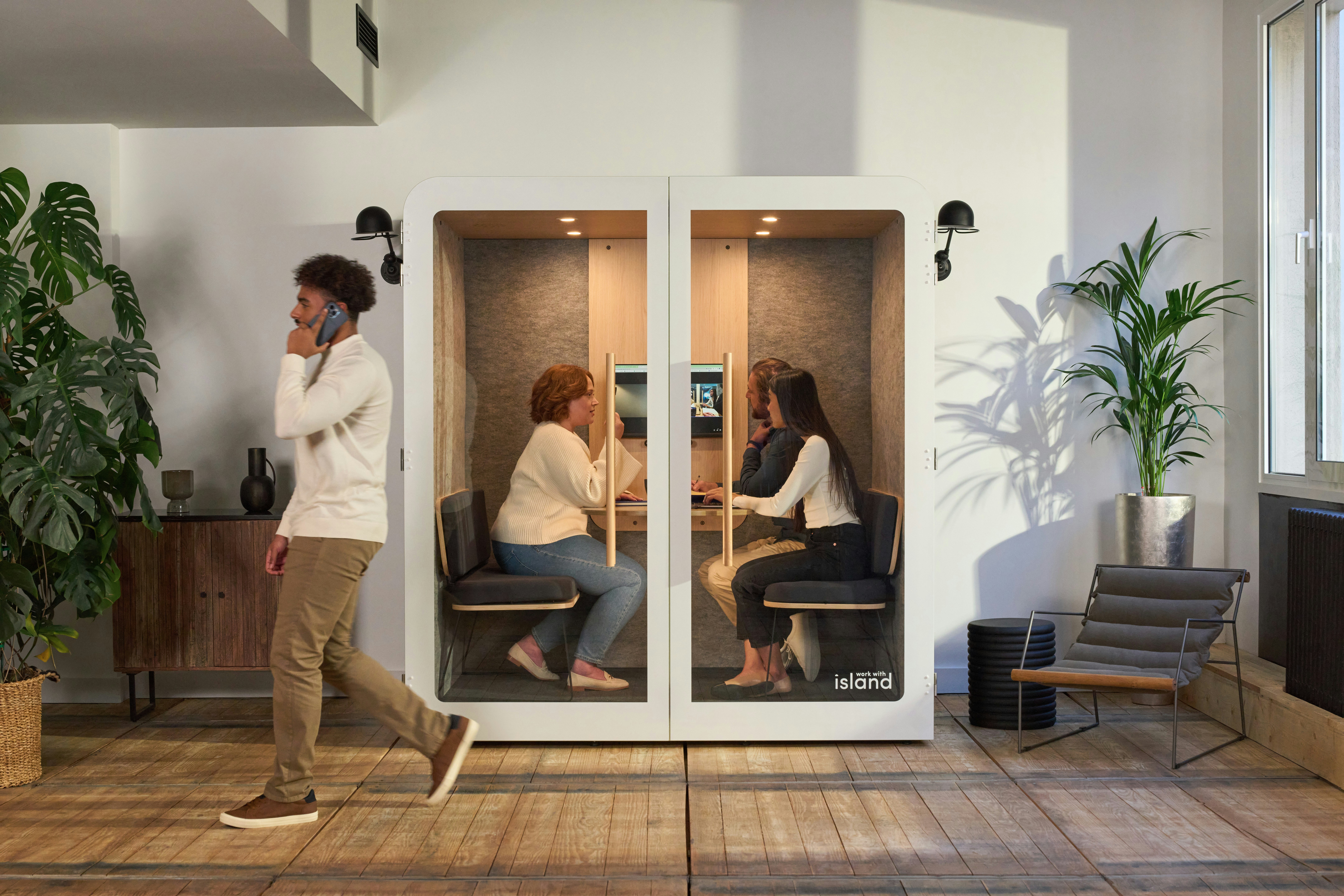 A couple of people in a room with a TV