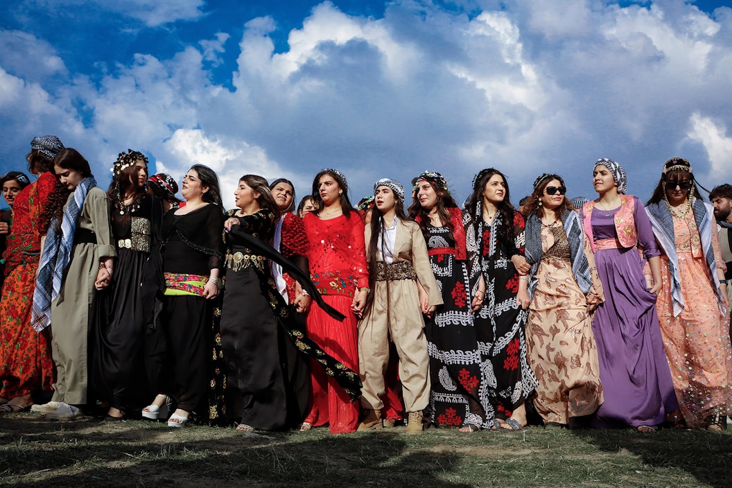 A group of people standing next to each other