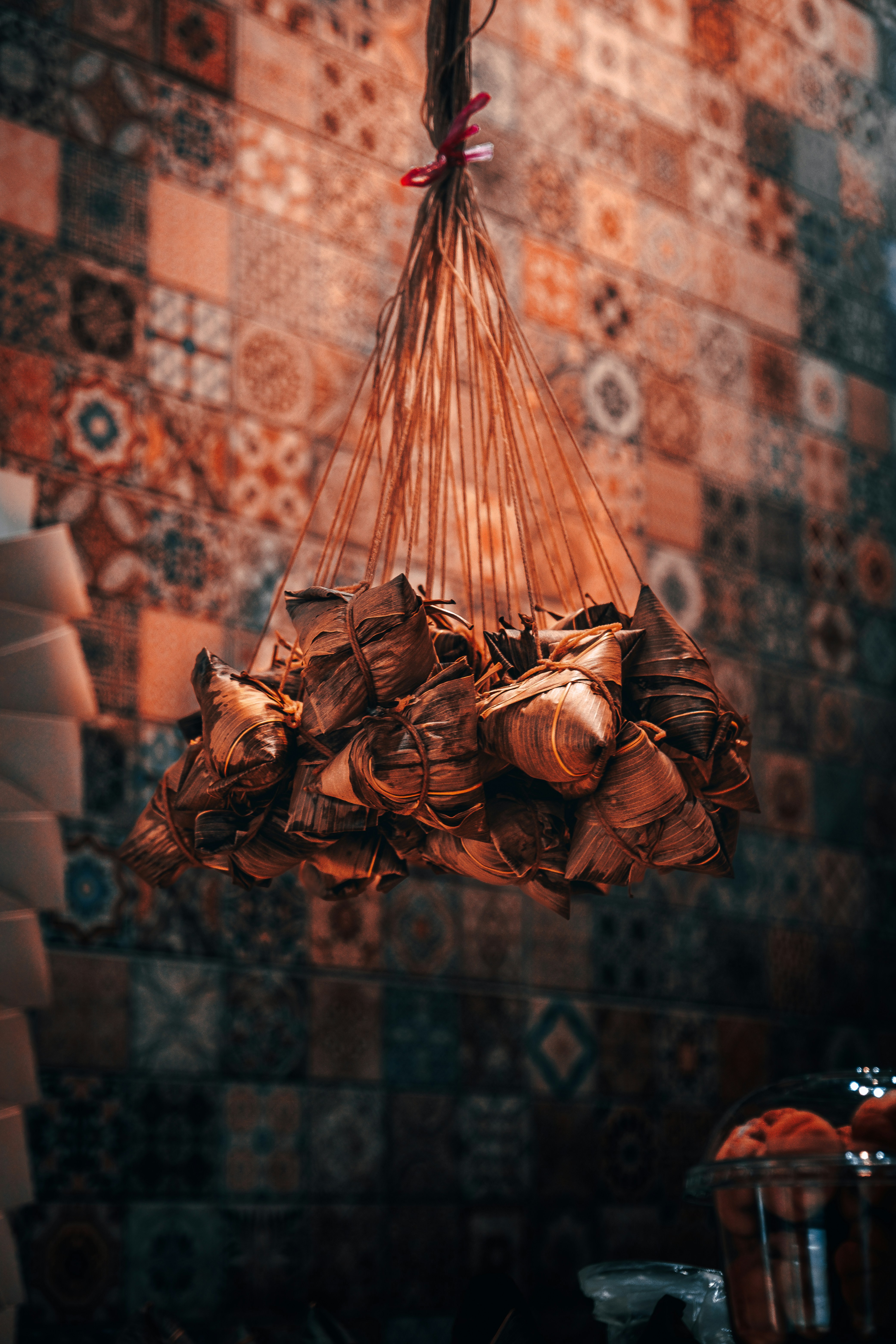 A light hanging from a ceiling in a room