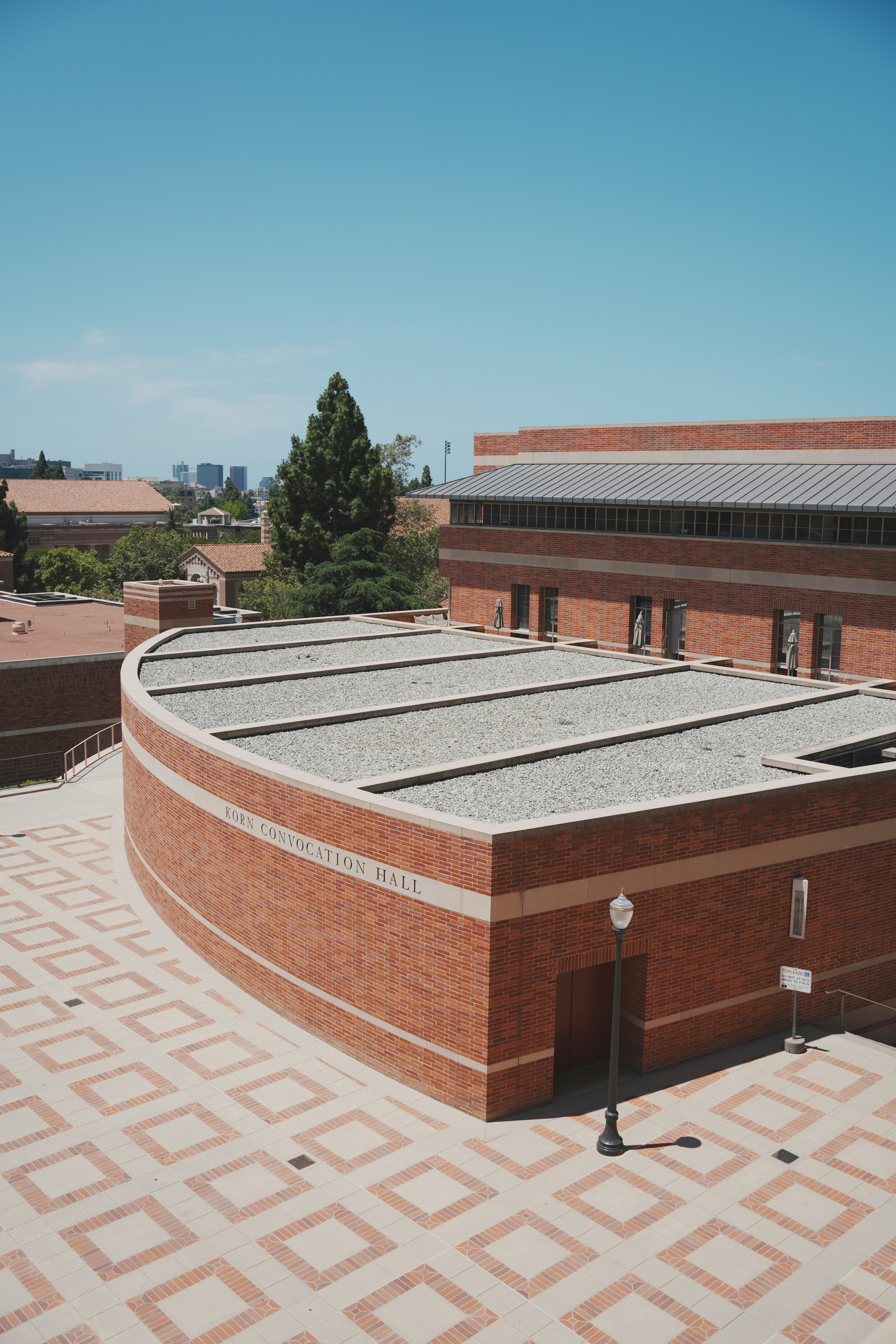 A brick building with a clock tower on top of it