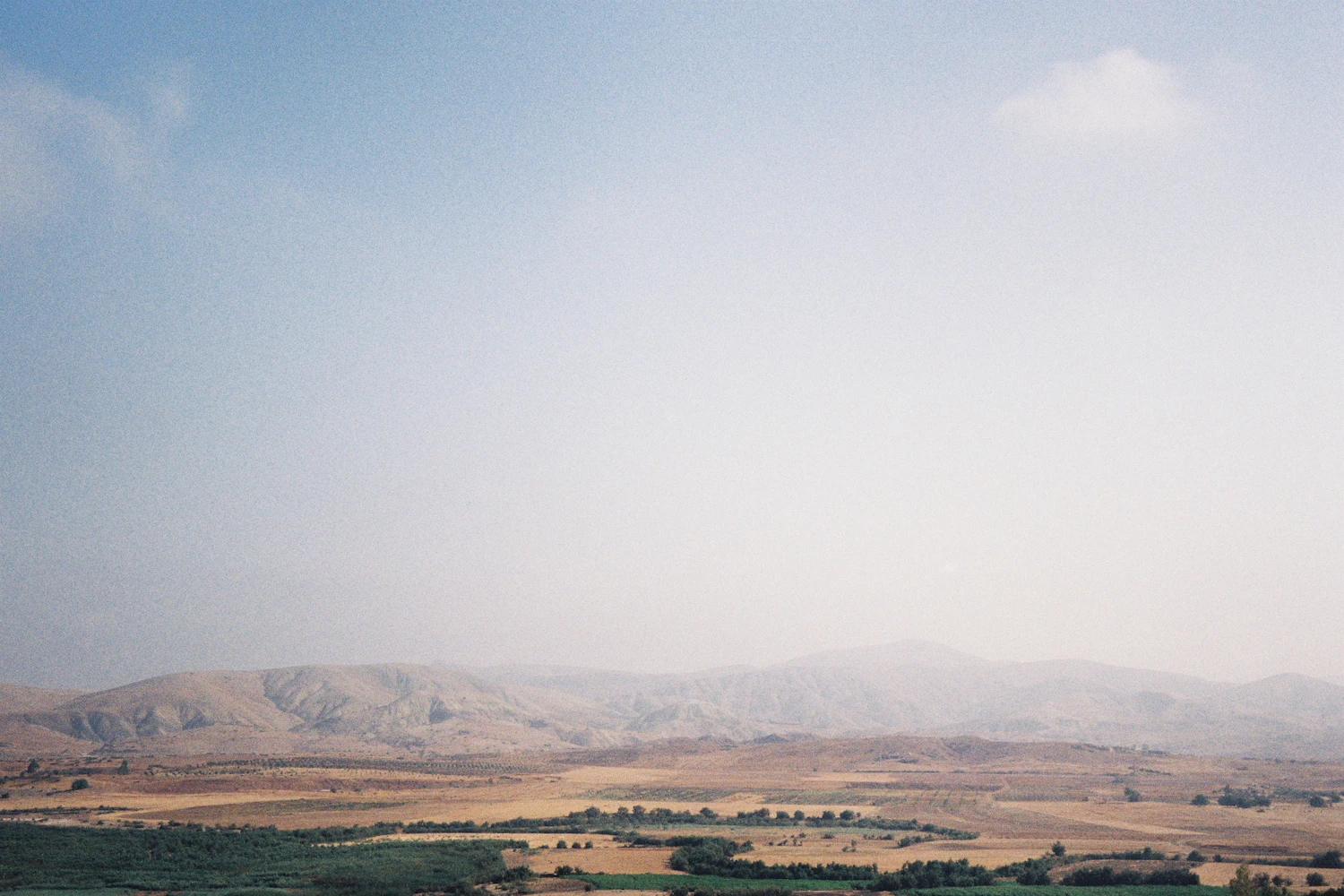 Fields and mountains in the Moroccan Atlas region