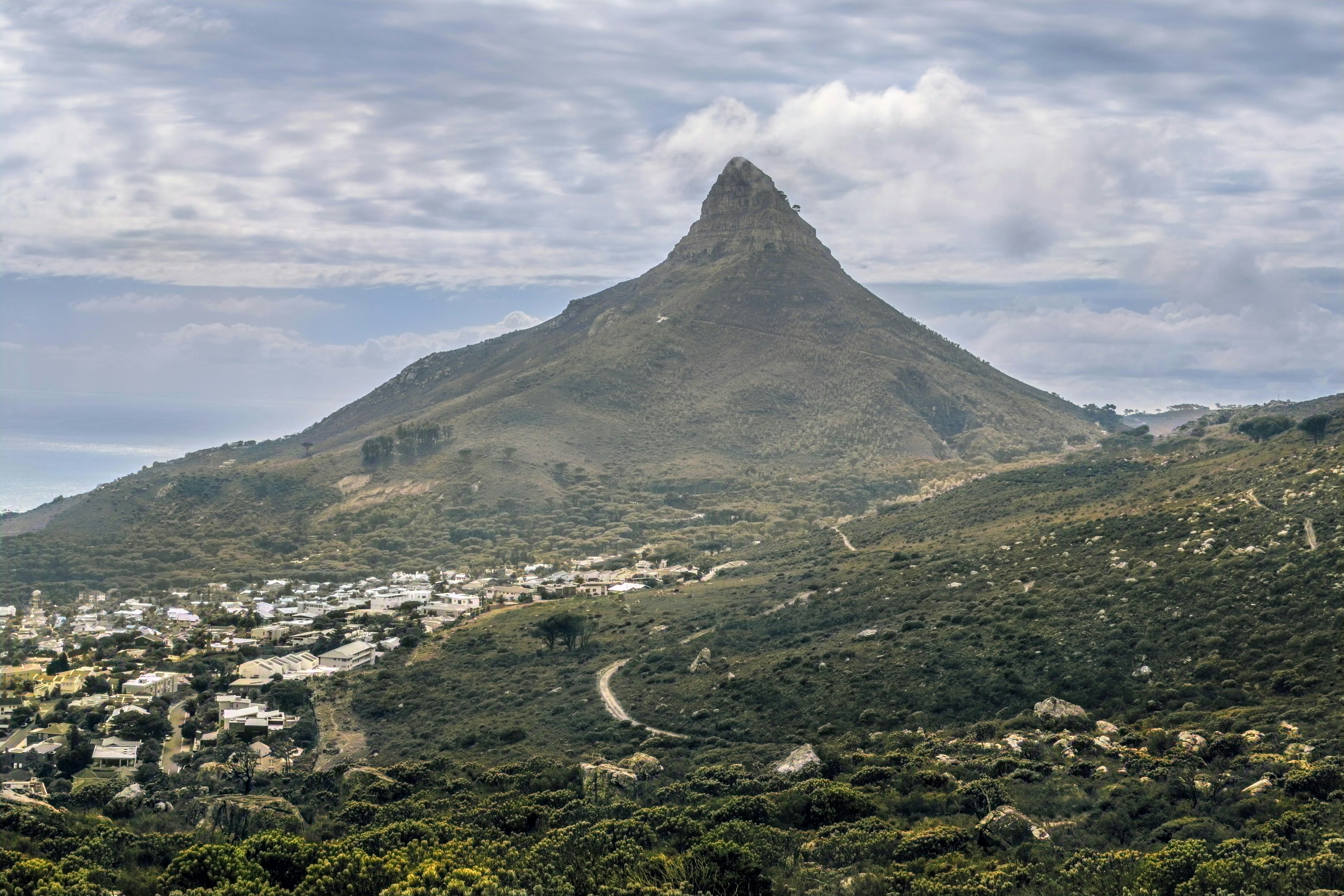 A view of a mountain with a city below it