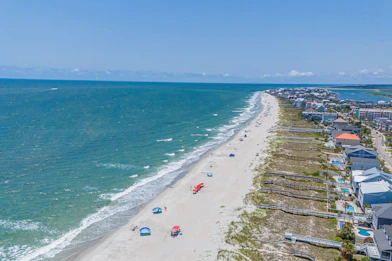 An aerial view of a beach and ocean