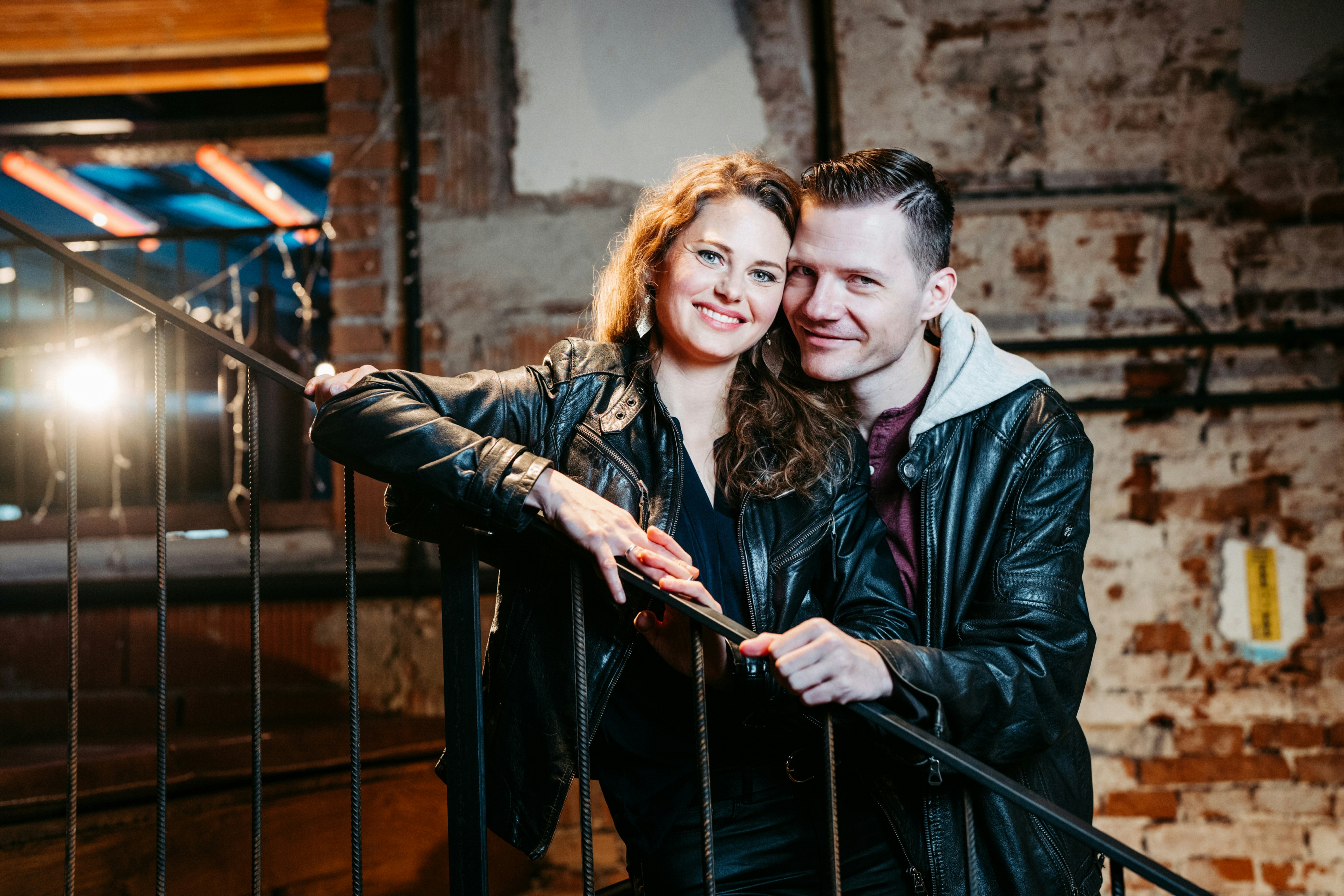 A man and a woman standing next to each other