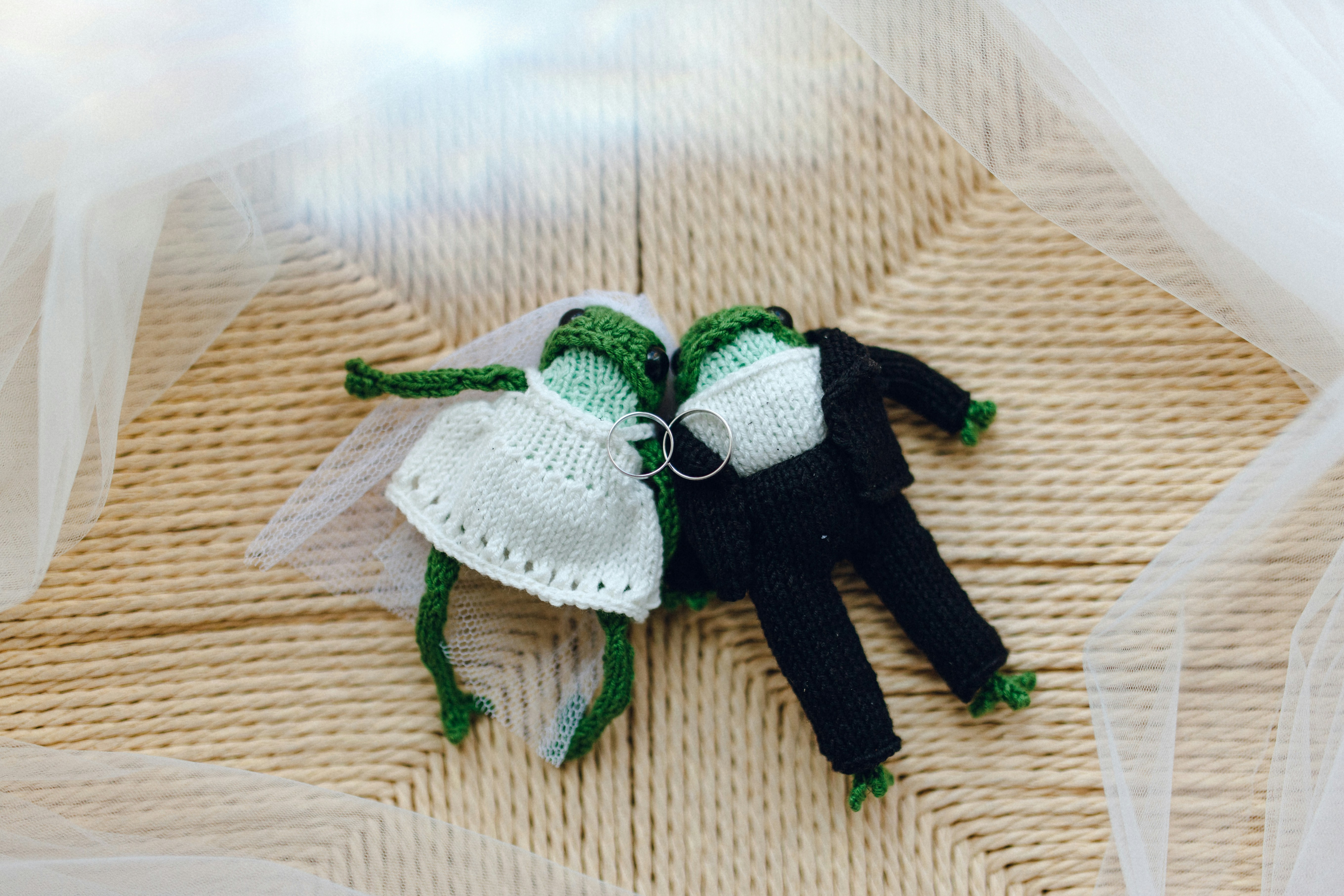 A couple of stuffed animals sitting on top of a table