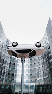 A street light with a car on top of it