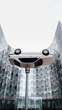 A street light with a car on top of it