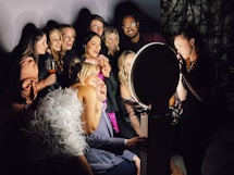 A group of people standing next to each other