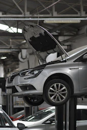 A car being worked on in a car repair shop