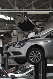 A car being worked on in a car repair shop