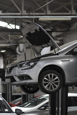 A car being worked on in a car repair shop