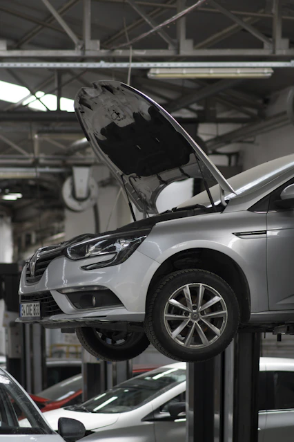 A car being worked on in a car repair shop
