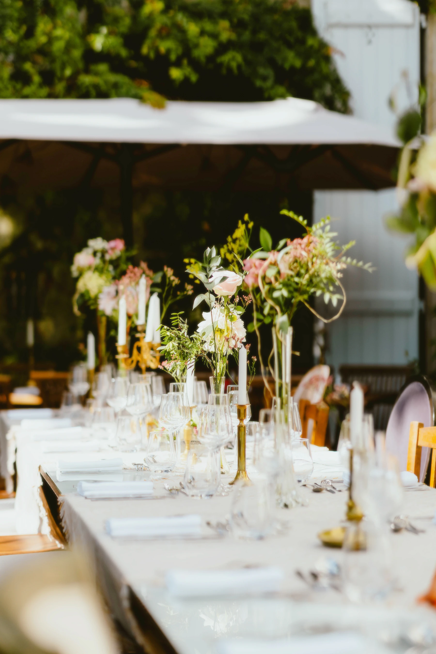 A long table styled with handwoven white cotton table linens