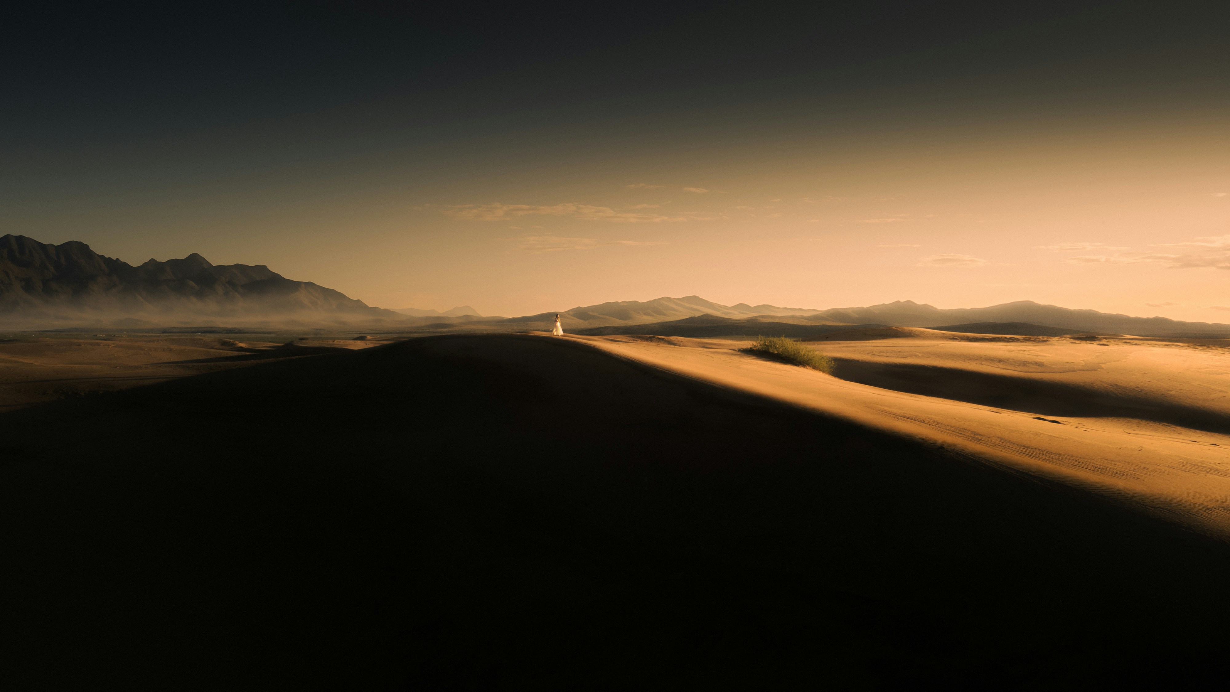 A blurry photo of a road in the desert