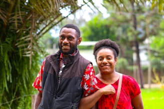 A man and a woman standing next to each other