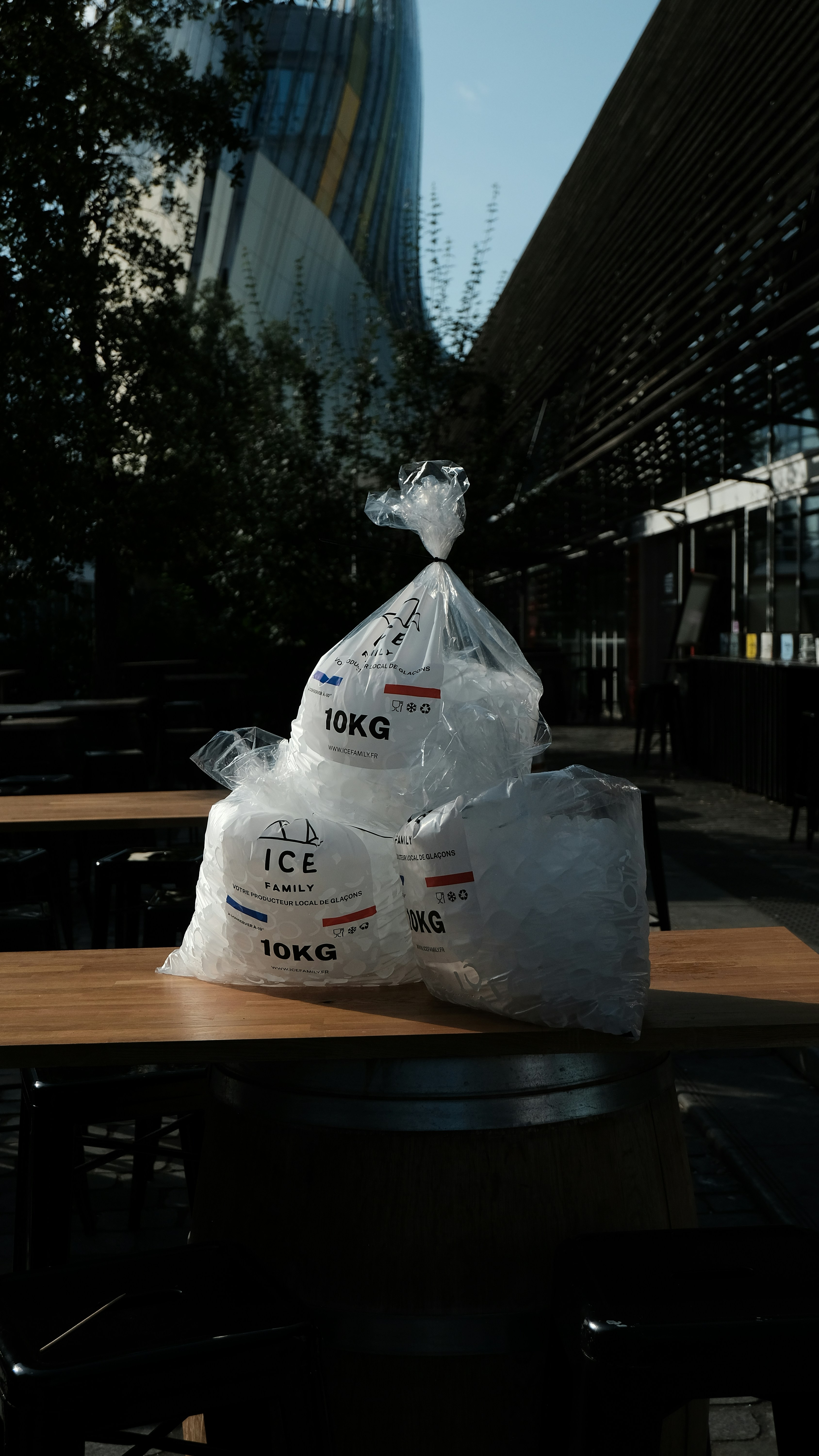 A plastic bag sitting on top of a wooden table