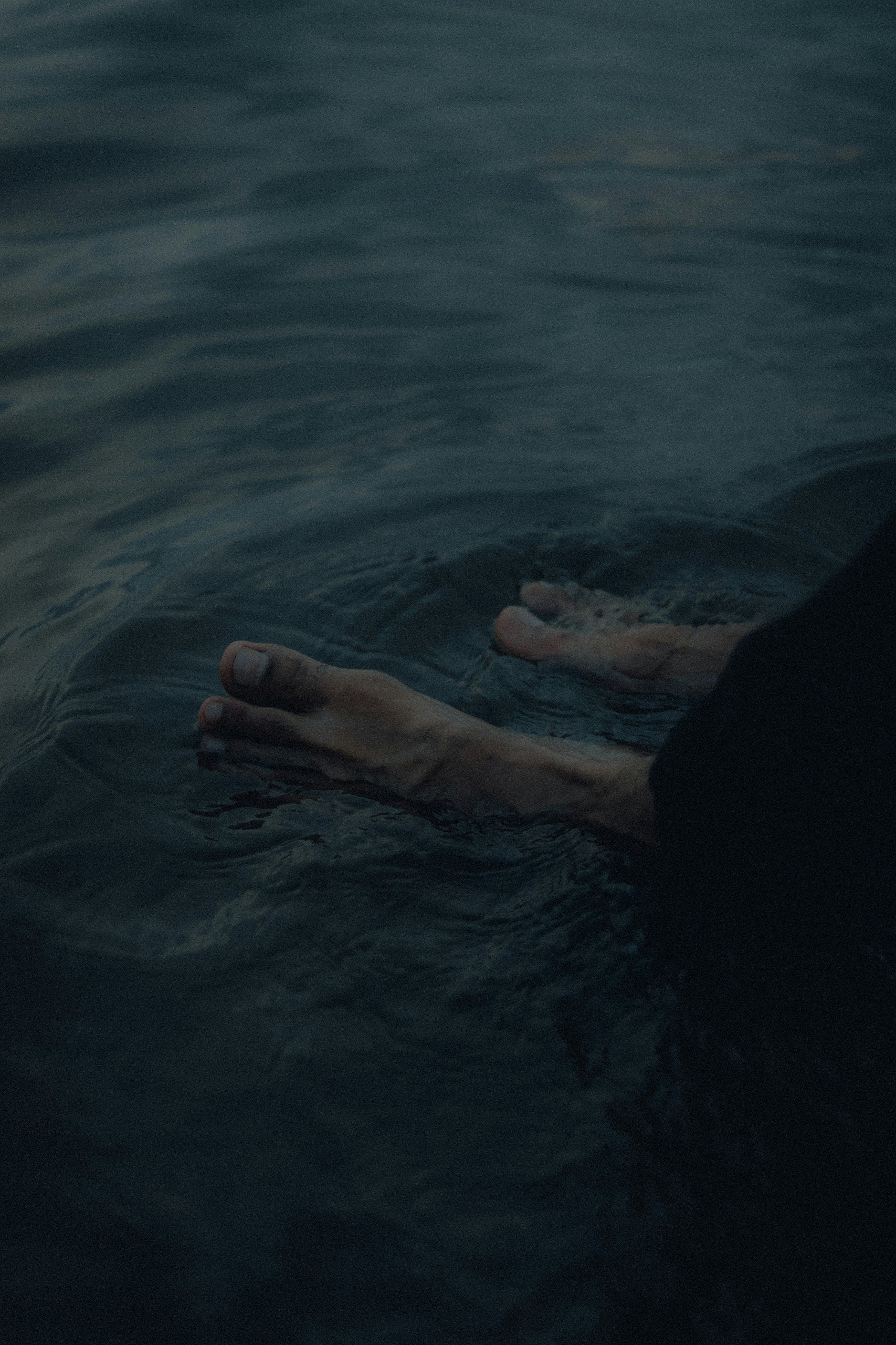 A person floating in a body of water