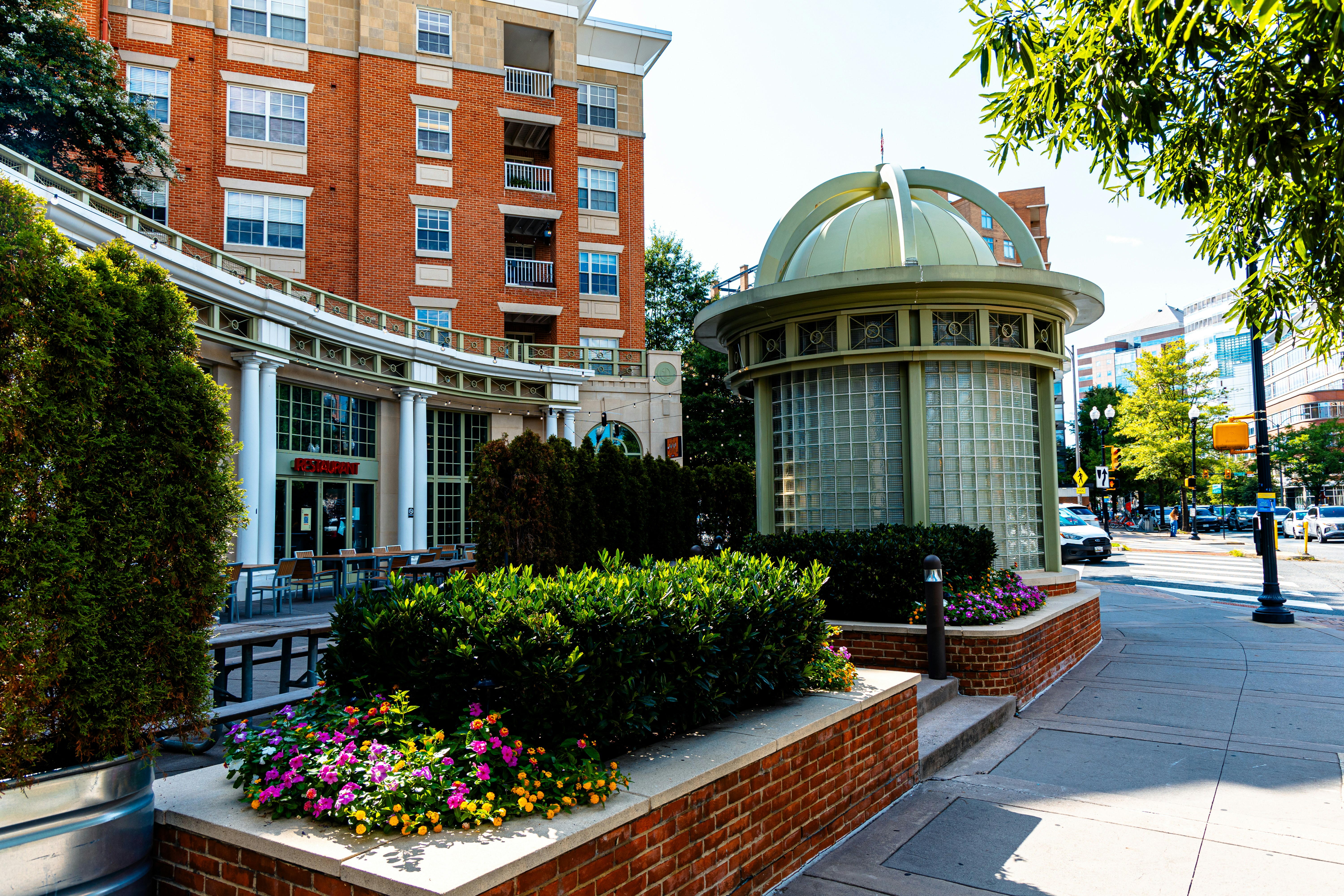 A building with a green dome on top of it