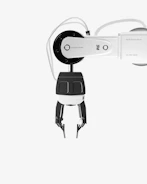 A robot holding a video game controller in its hands