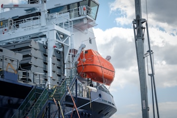 A large boat with a life preserver attached to it